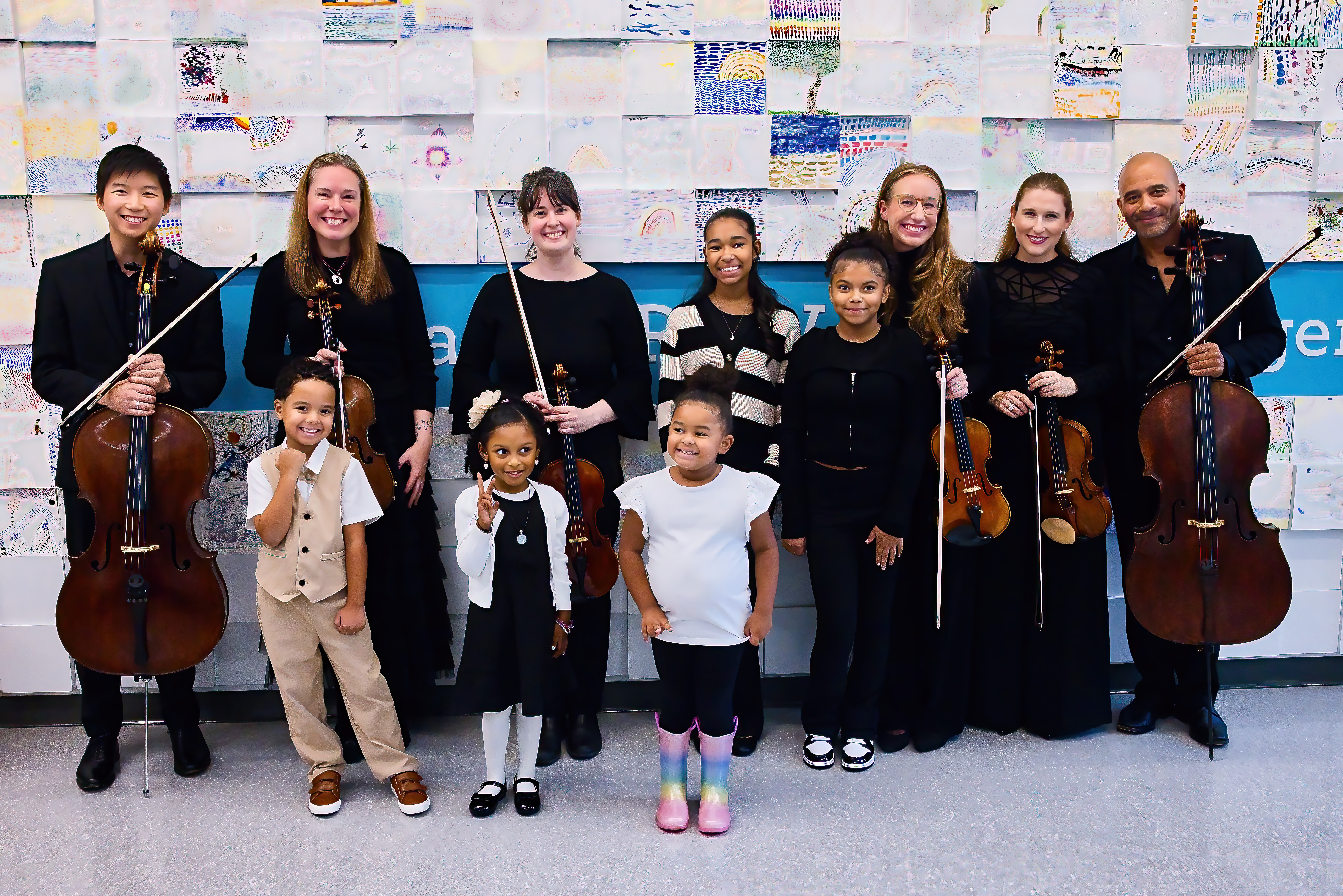 BSO musicians pose with Conservatory Lab Students