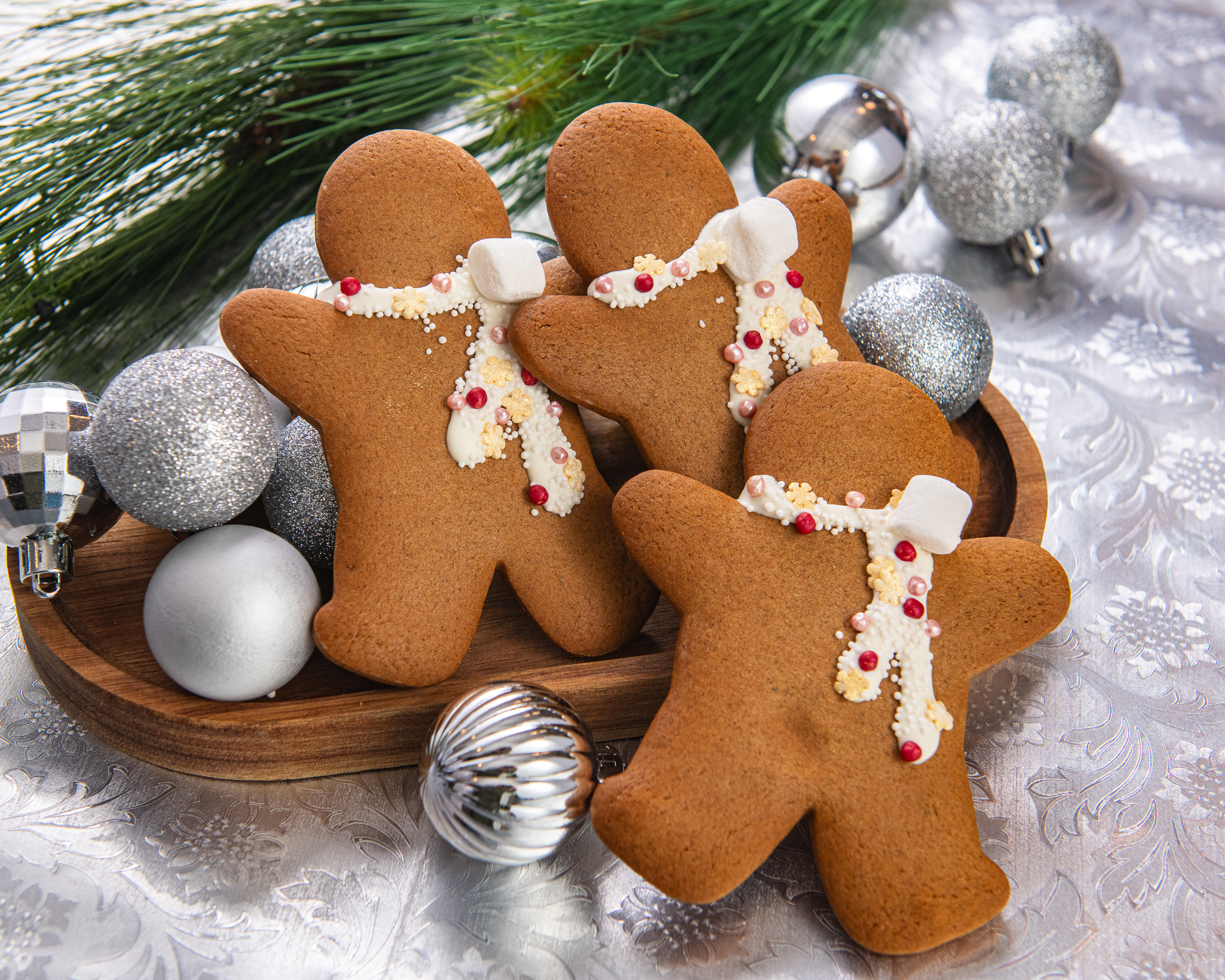 Gingerbread Cookies in a basket with small silver ornaments