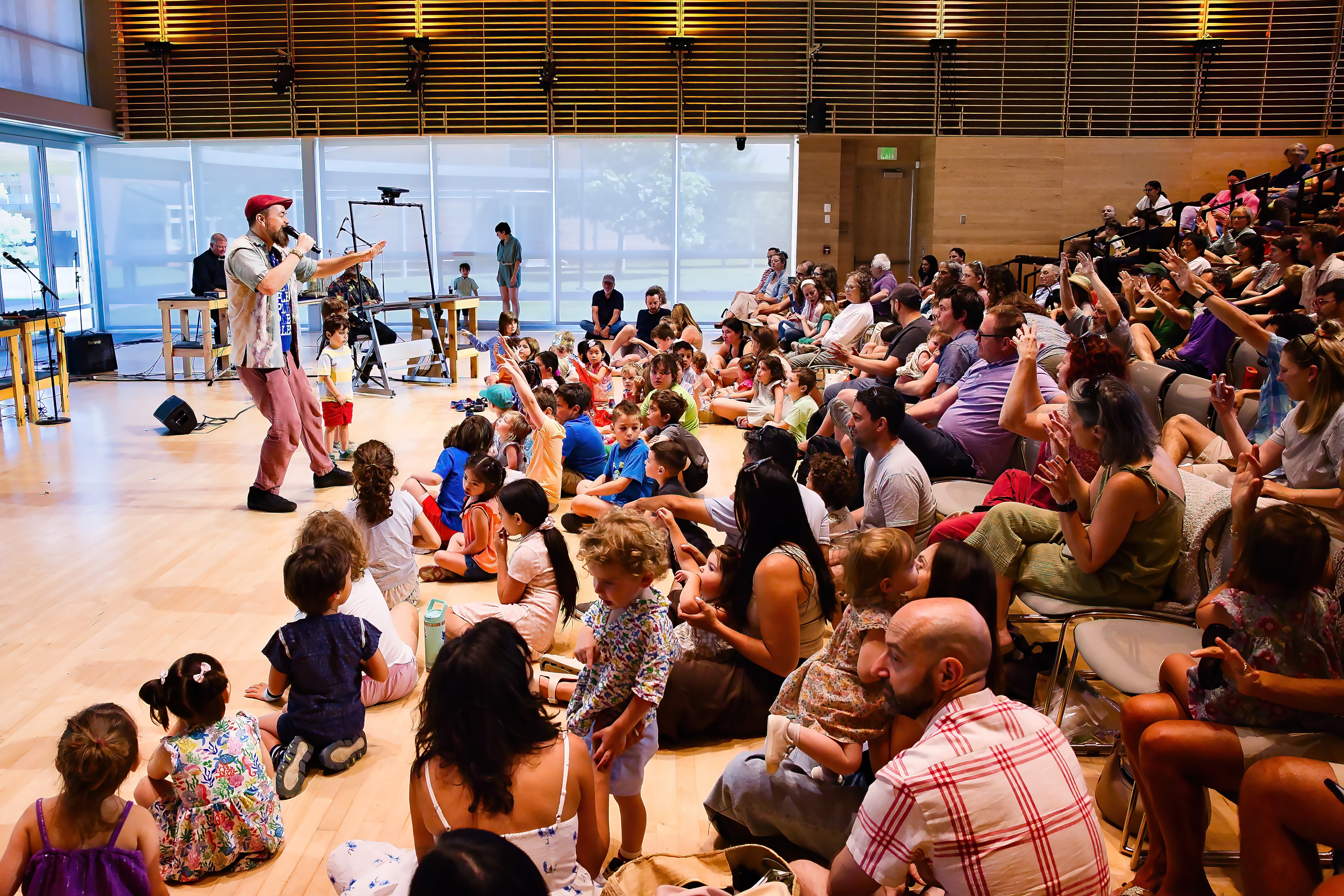 Baba Israel Performs for children during TLI