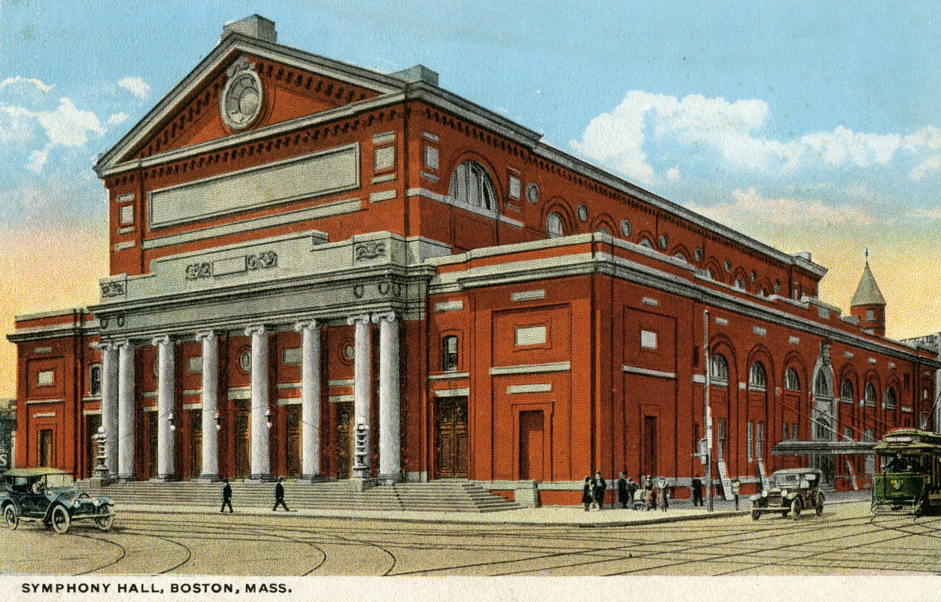 Postcard featuring the exterior of Symphony Hall, with green trolley and model T cars on the road