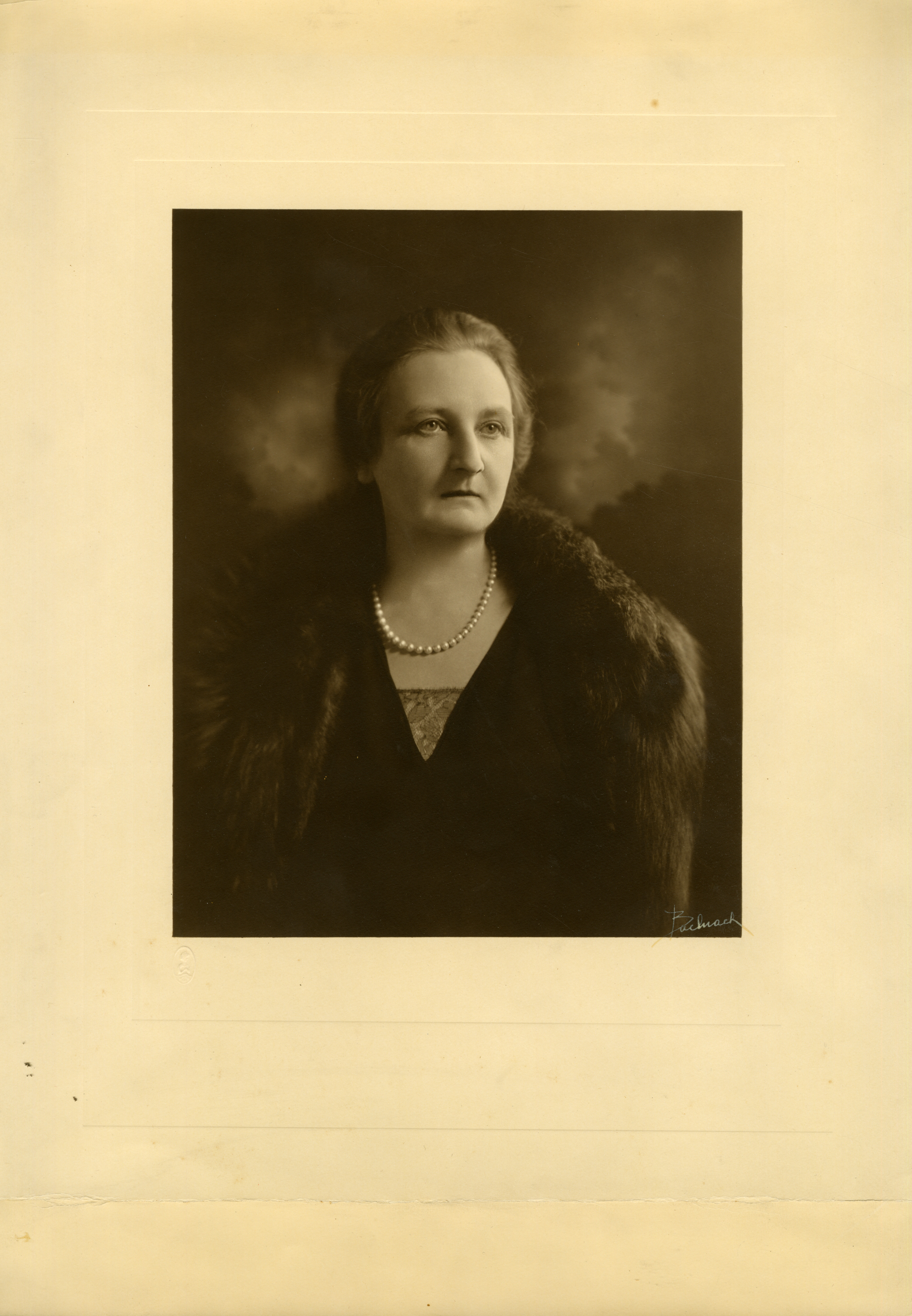 Portrait of Natalie Koussevitzky wearing a pearl necklace and furs