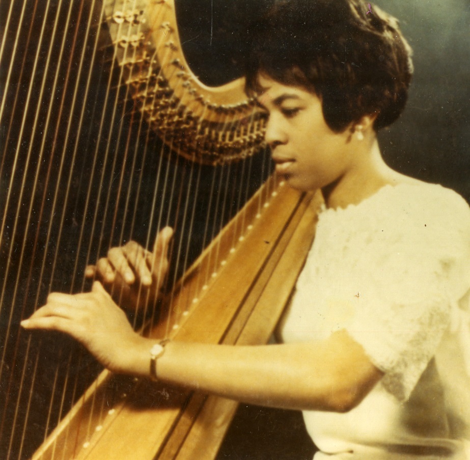 Color snapshot of Ann Hobson Pilot playing the harp