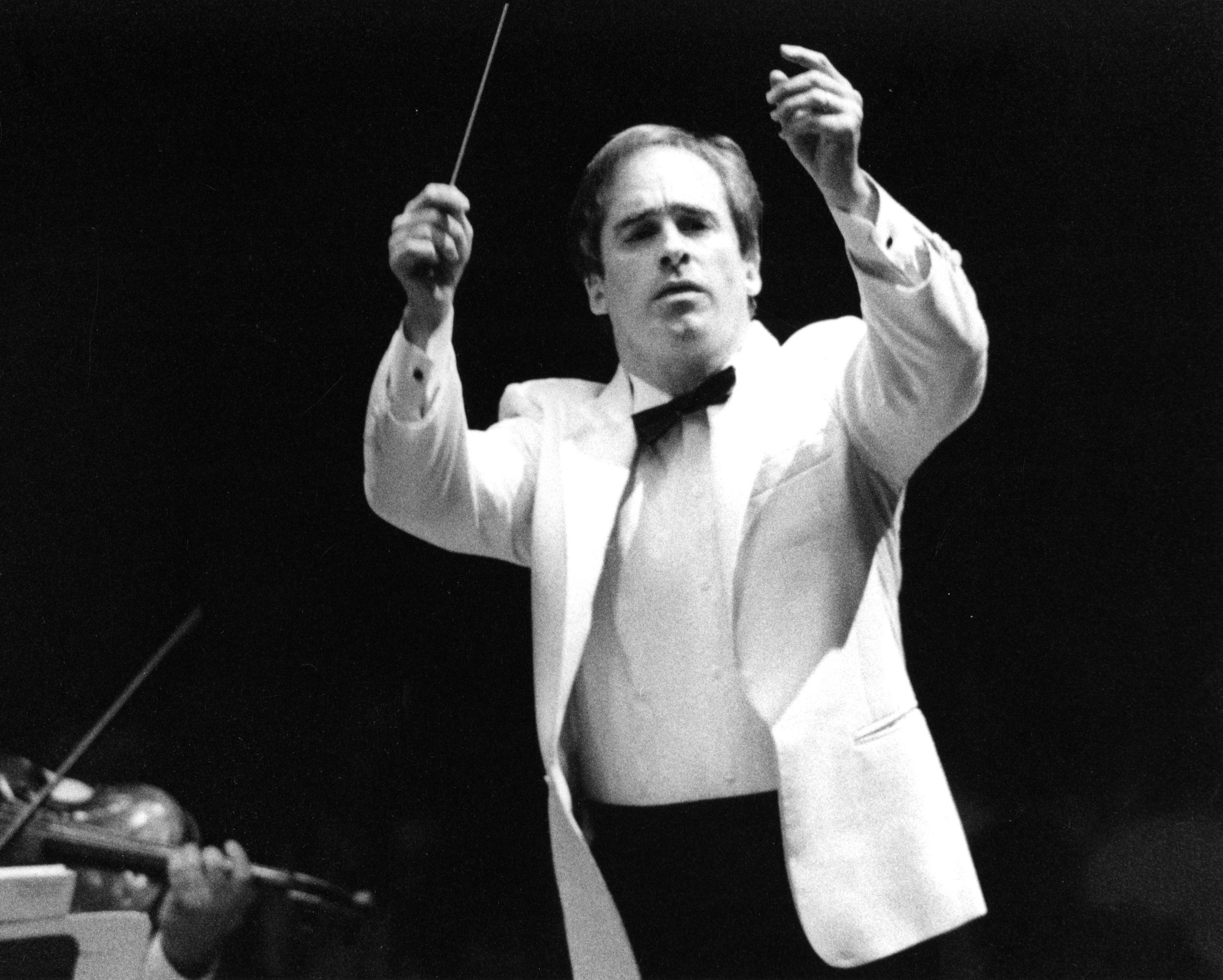 Black and white photo of James Conlon conducting a concert