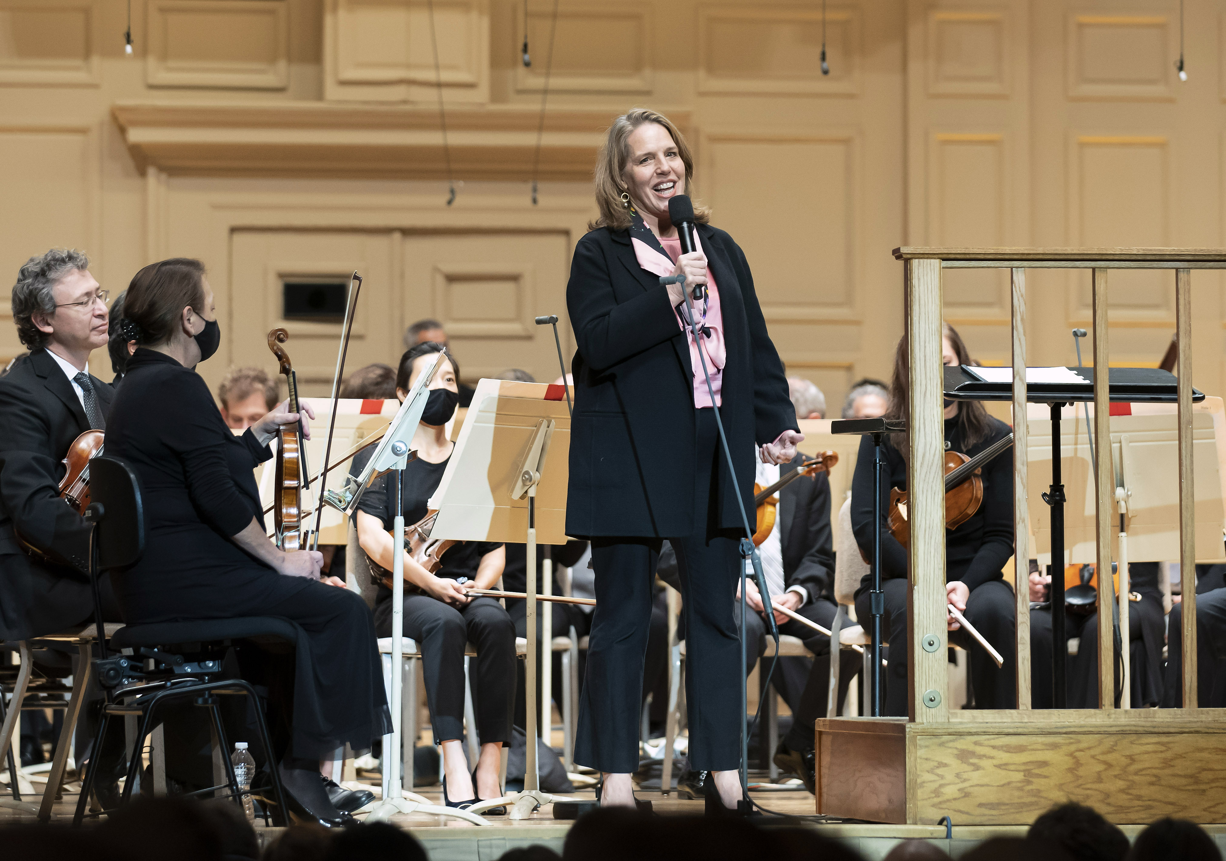Gail Samuel on stage at Symphony Hall addressing the audience