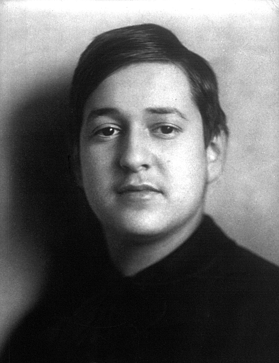 A black and white headshot of composer Erich Kornhold