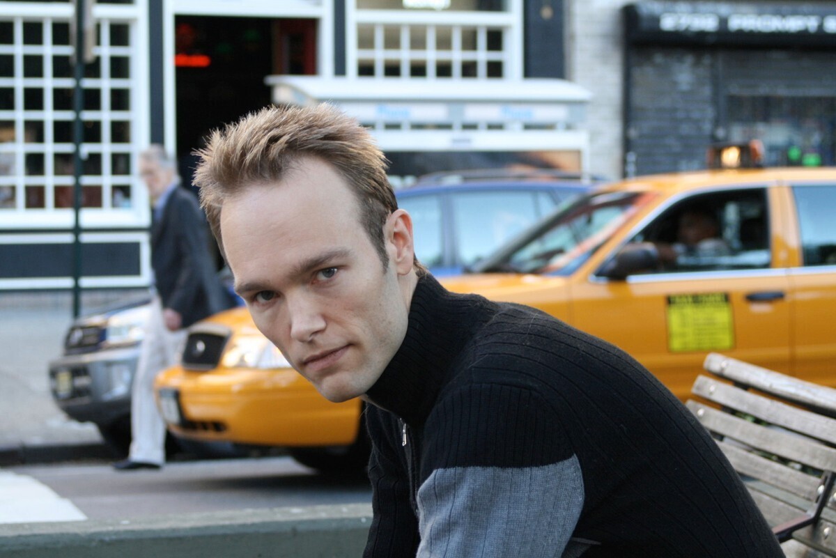 Photo of Paul Haas with a yellow taxi in the background