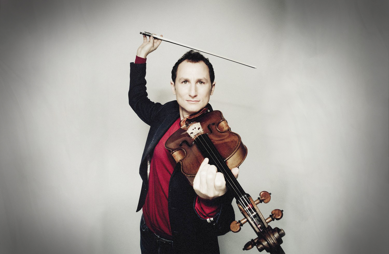 Antoine Tamestit holding a viola