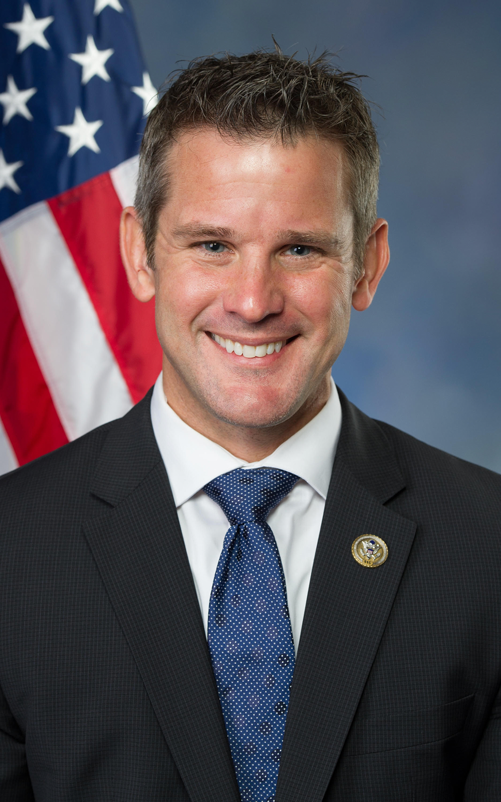 A headshot of Adam Kinzinger