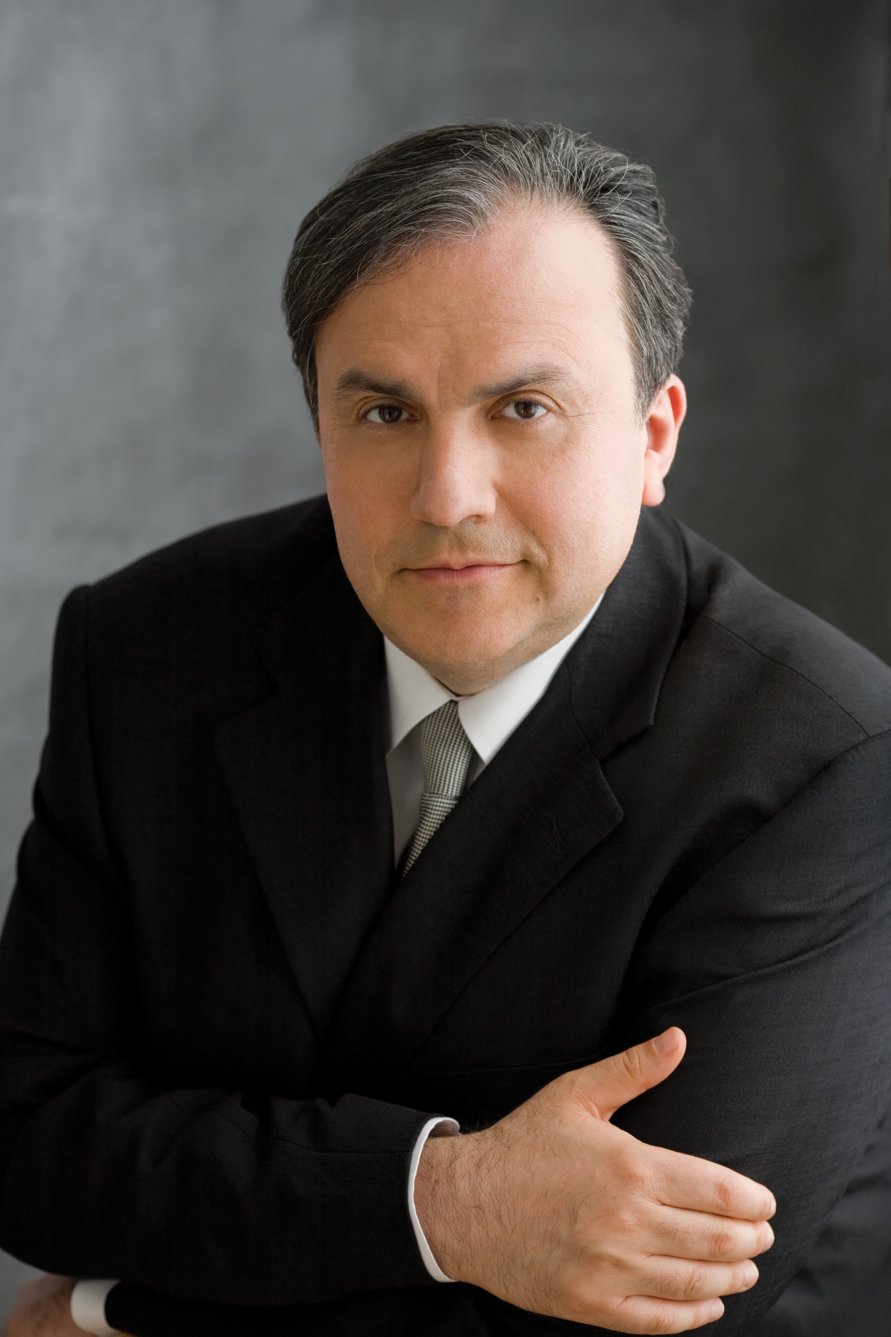 A headshot of Yefim Bronfman wearing a tuxedo
