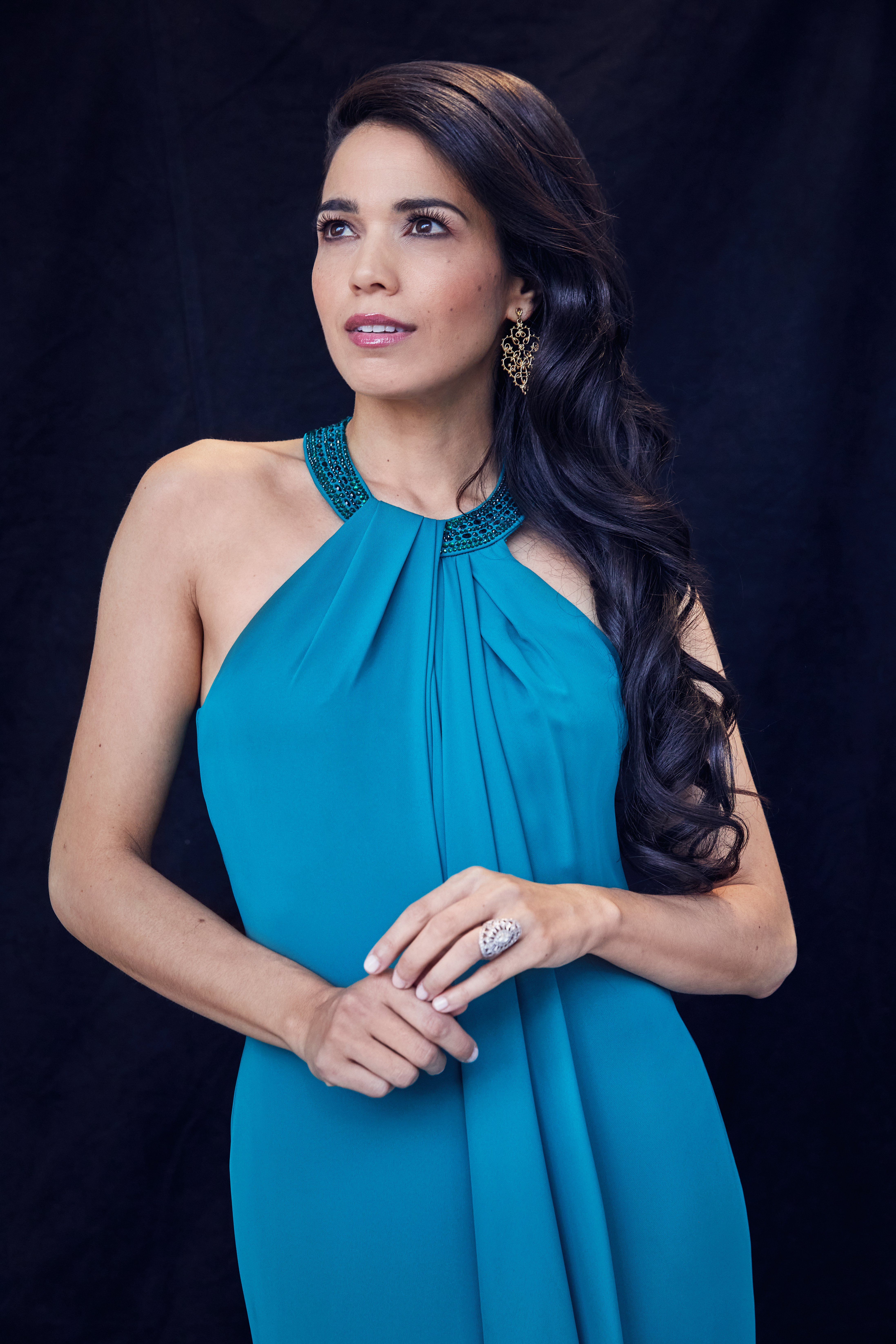 Arielle Jacobs wearing a teal gown
