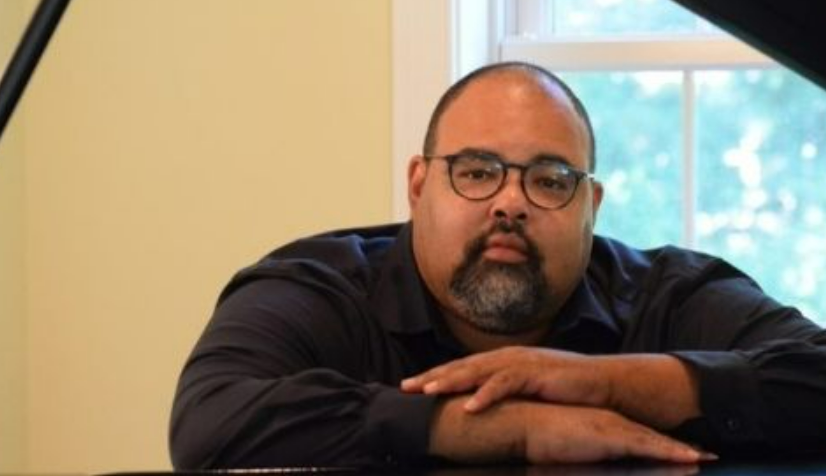 David Freeman Coleman sitting at the piano.
