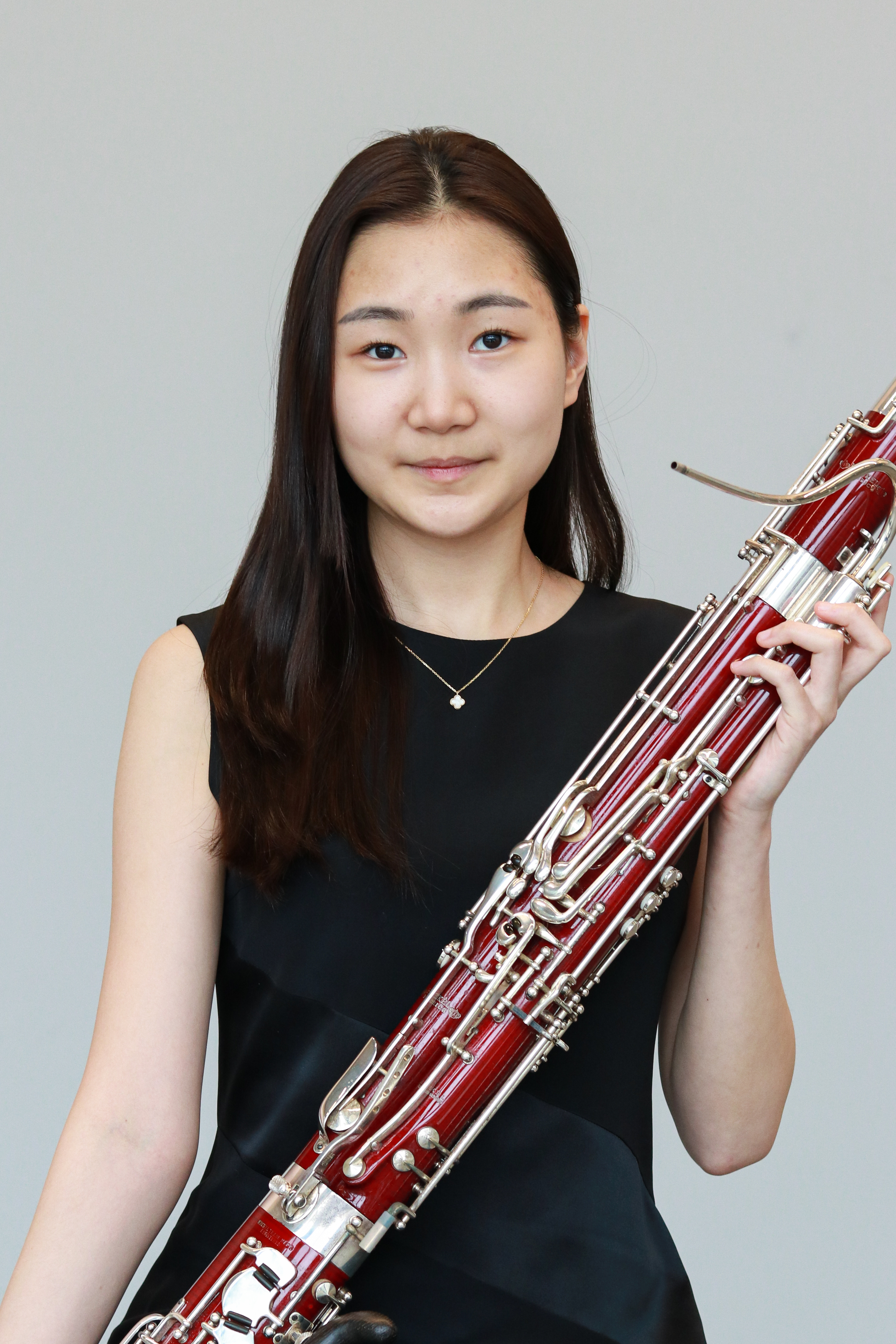 2023 BSO Concert Competition Winner Ye Sol (Joanna) Yi holding a bassoon