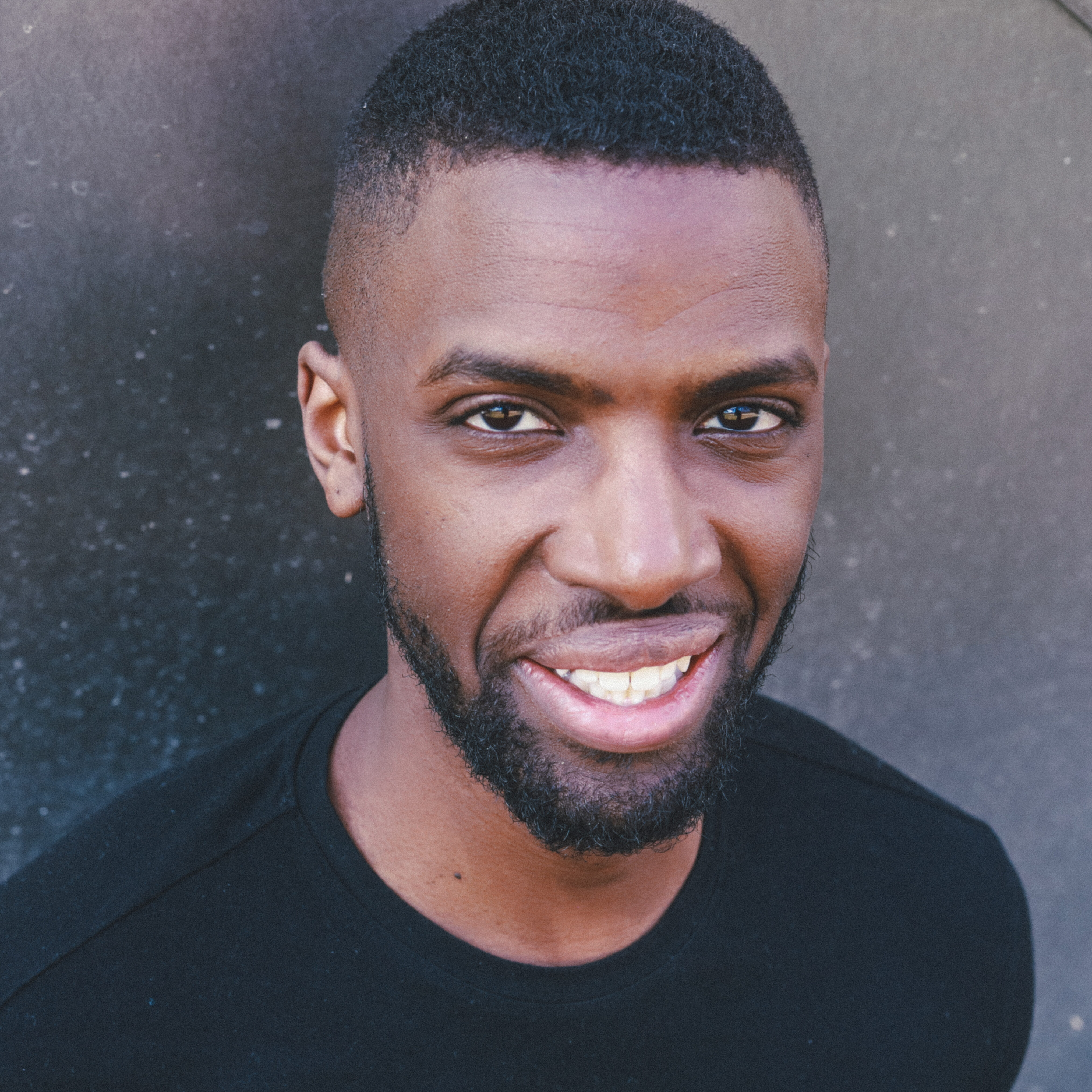 A headshot of Wayne Arthur