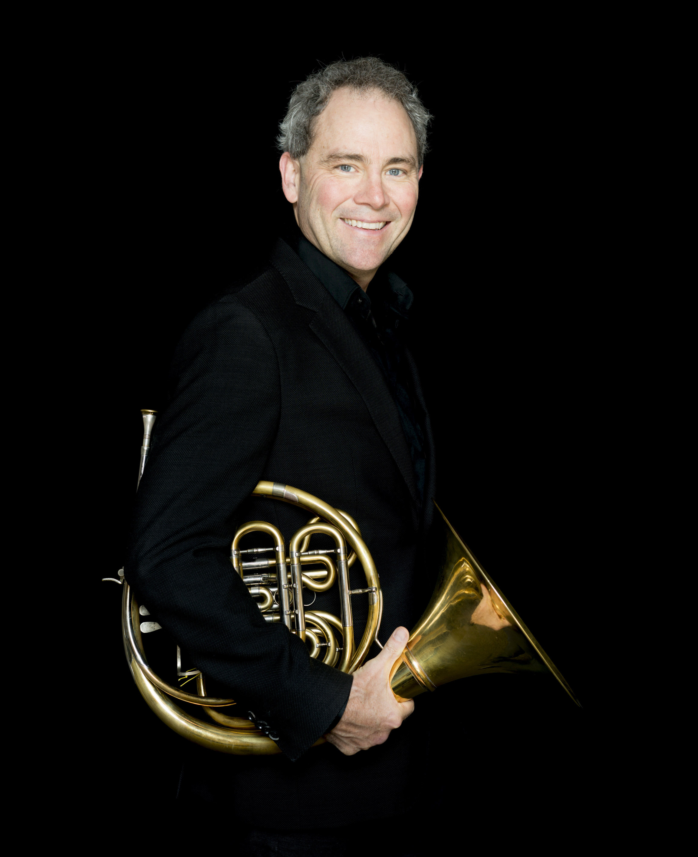 James Sommerville headshot with French Horn