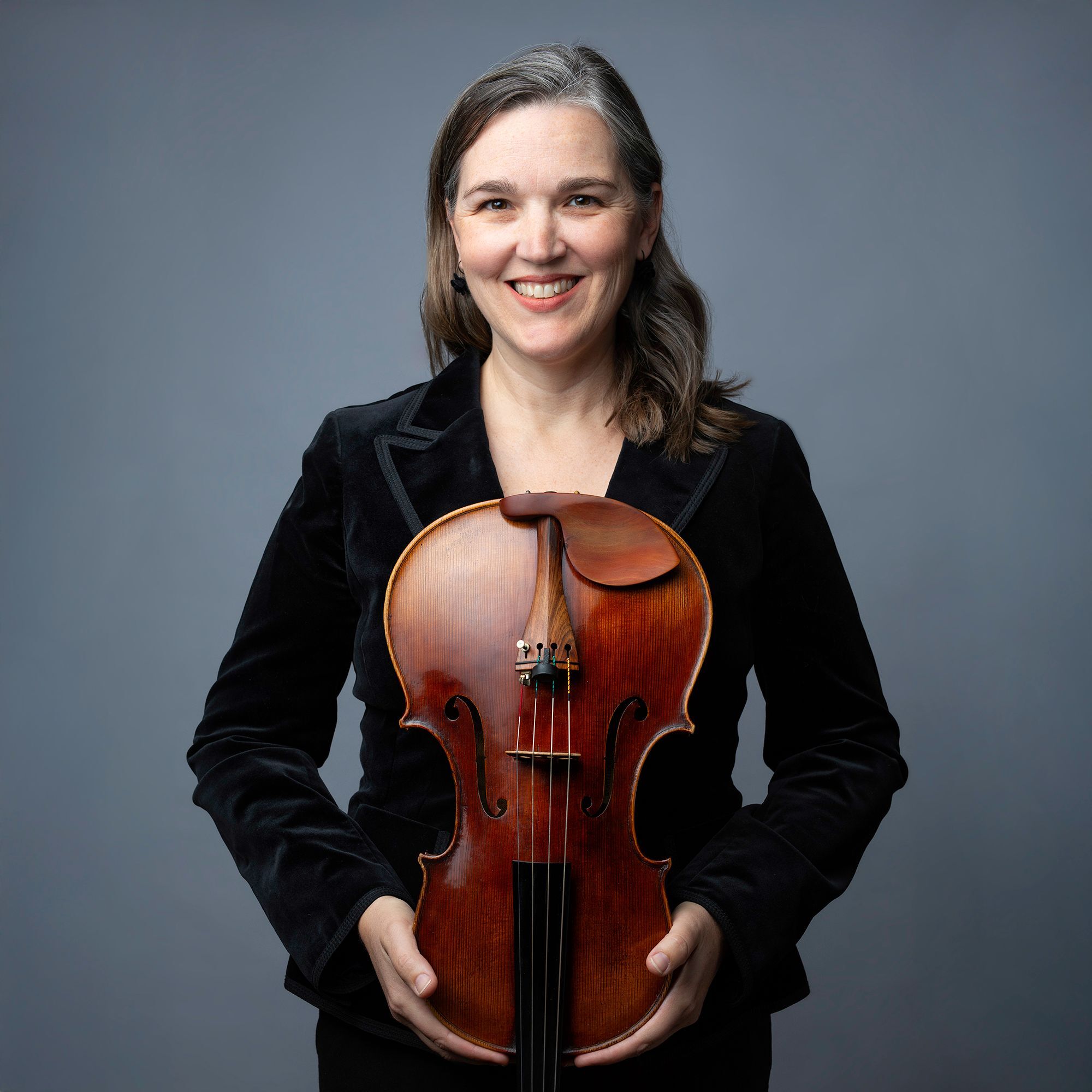 Kathryn Sievers headshot with viola