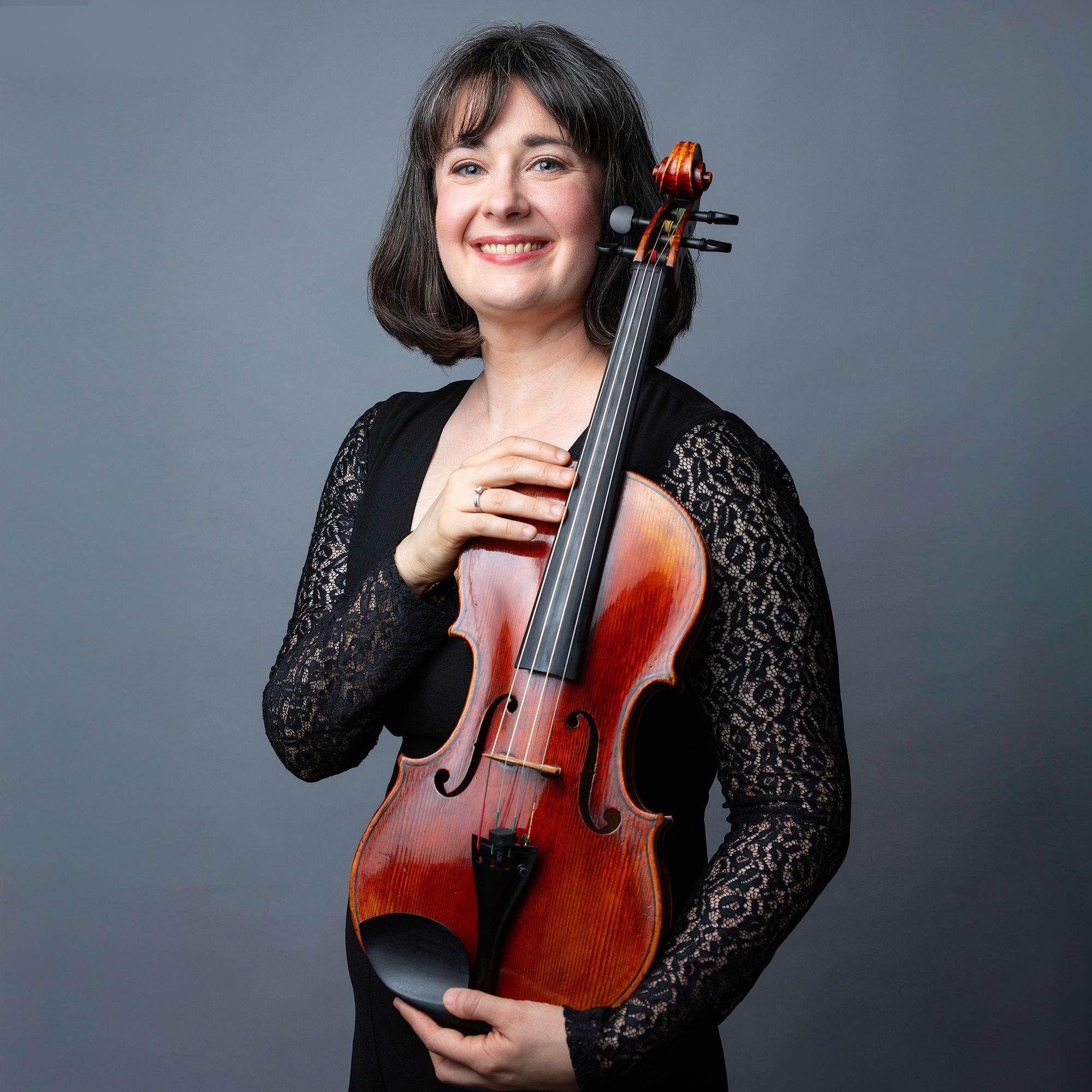 Mary Ferrillo headshot with viola