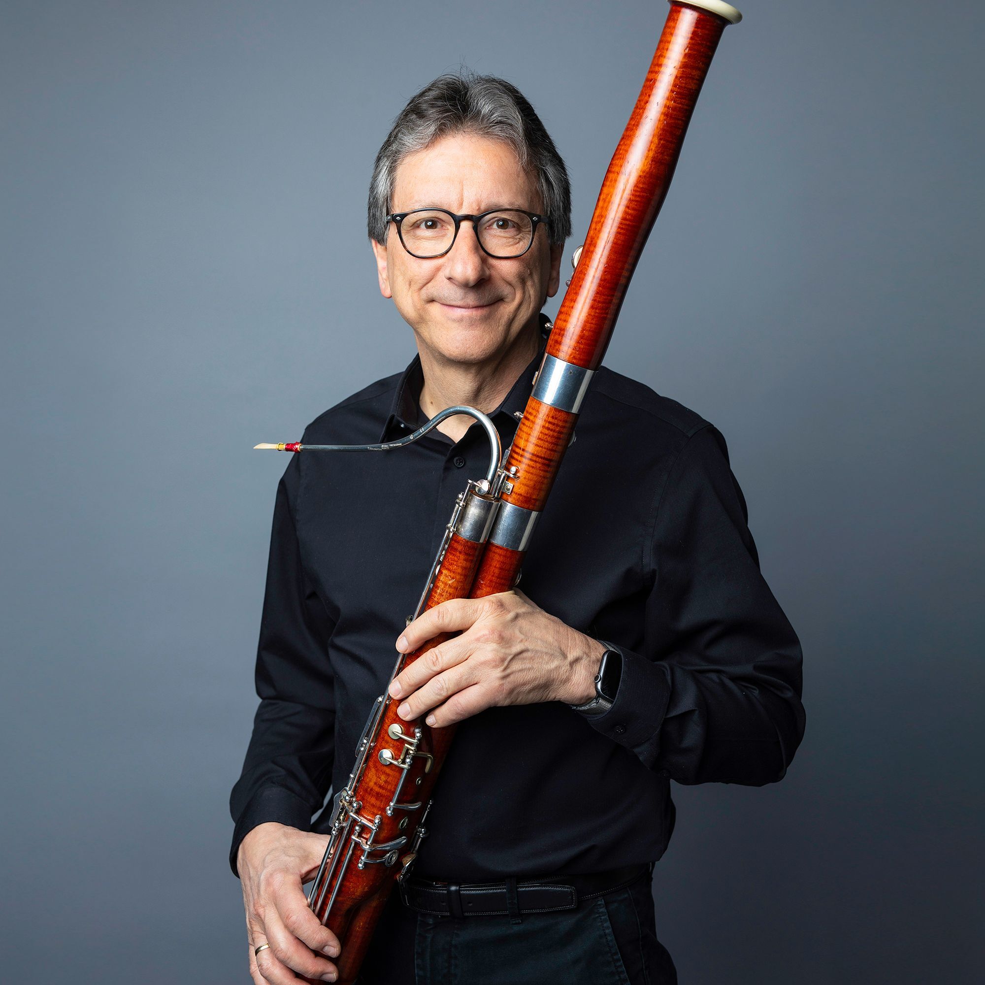 Richard Svoboda headshot with bassoon