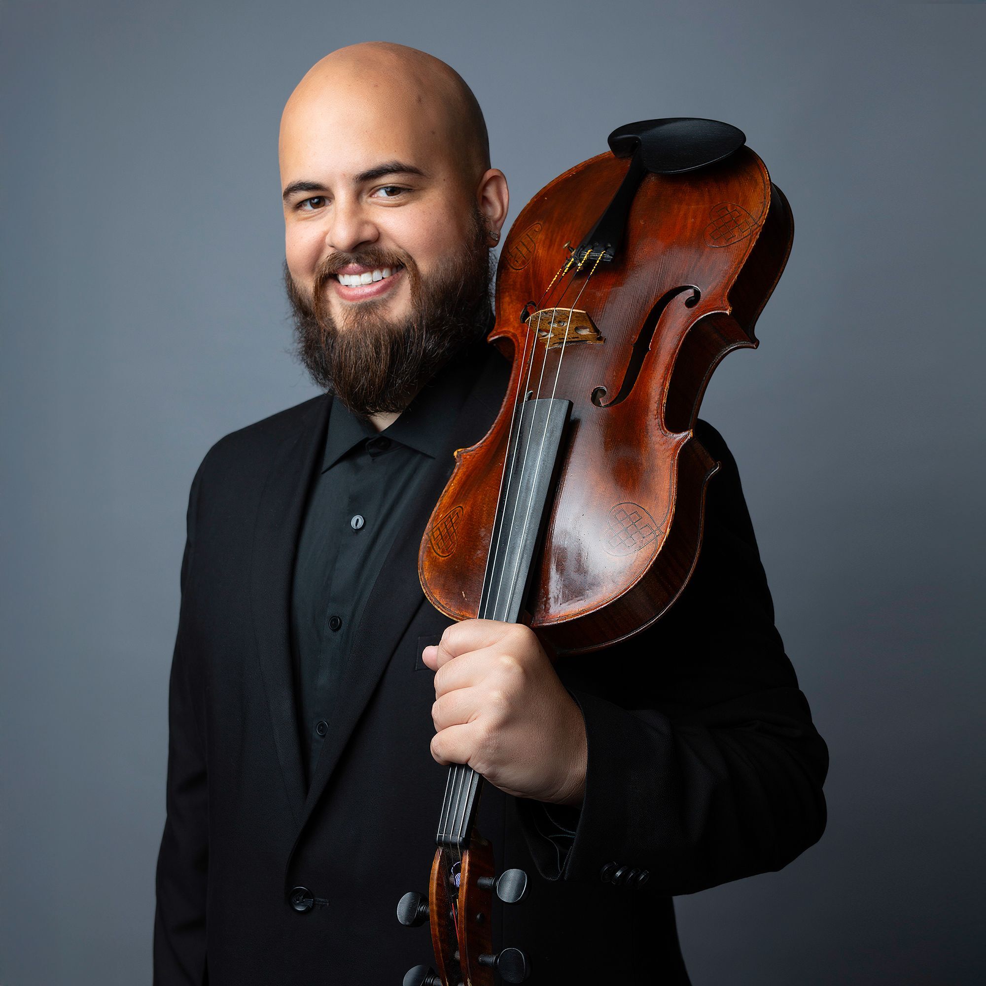 Steven O. Laraia headshot with viola