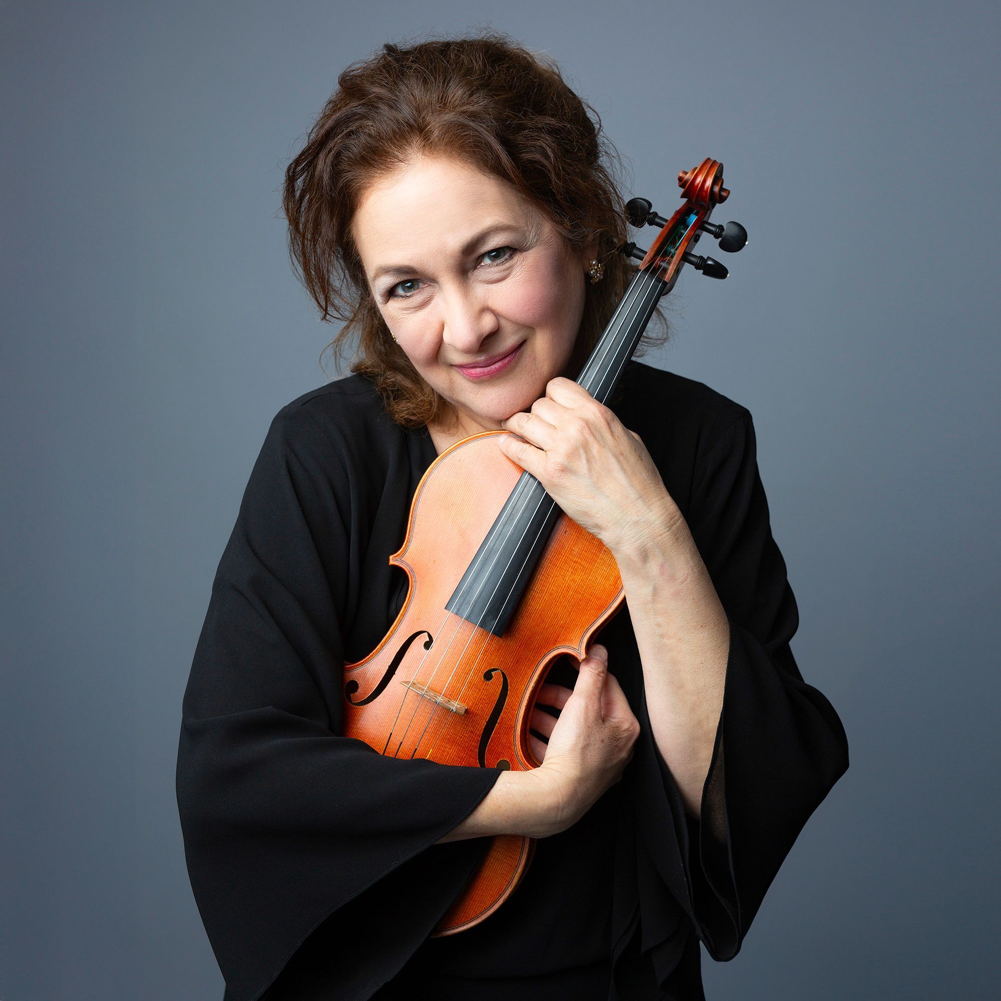 Tatiana Dimitriades headshot with violin