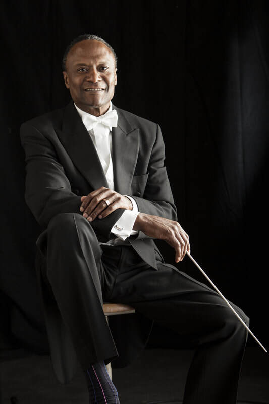 Thomas Wilkins headshot with baton