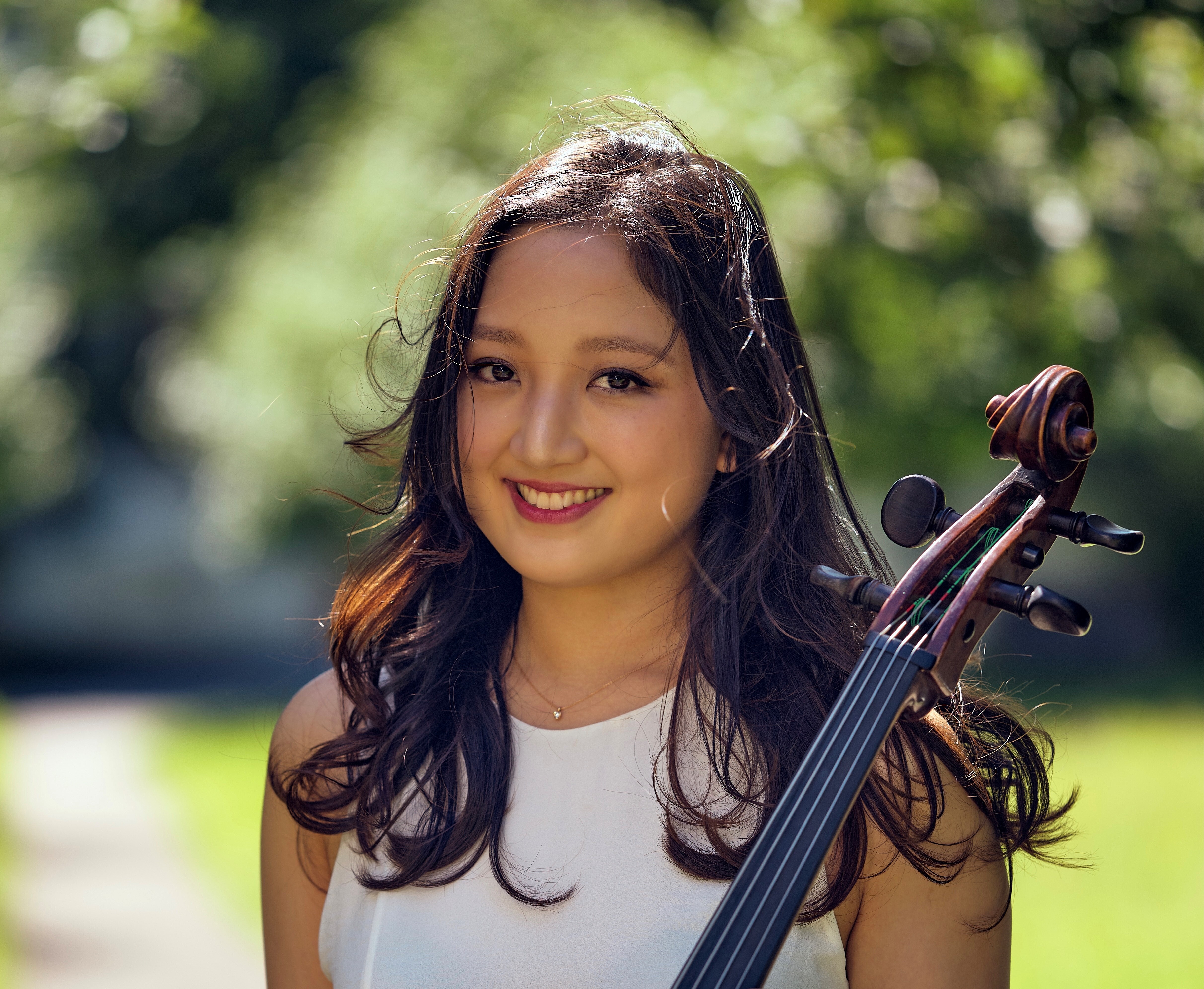 Hayoung Choi outside with her instrument