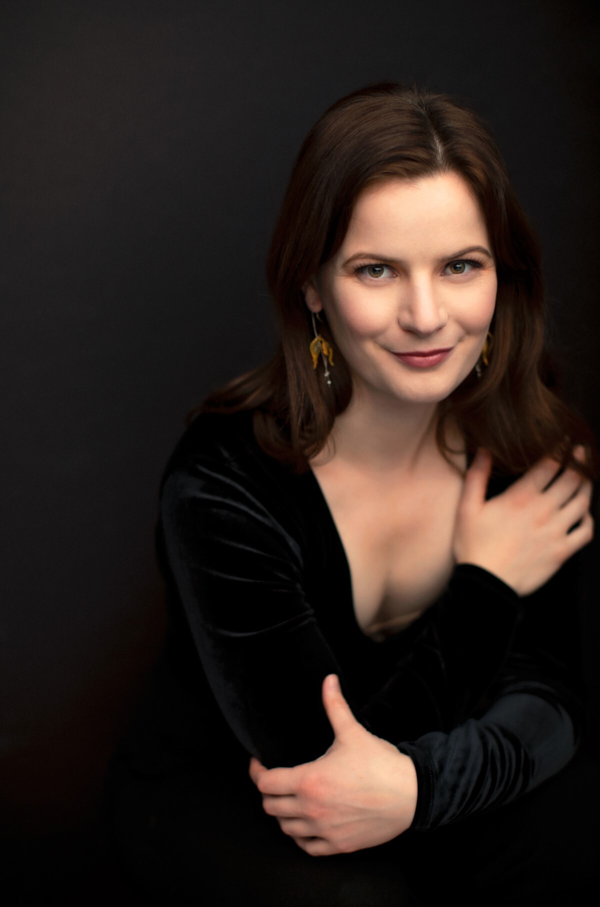 Liv Redpath in front of a black background