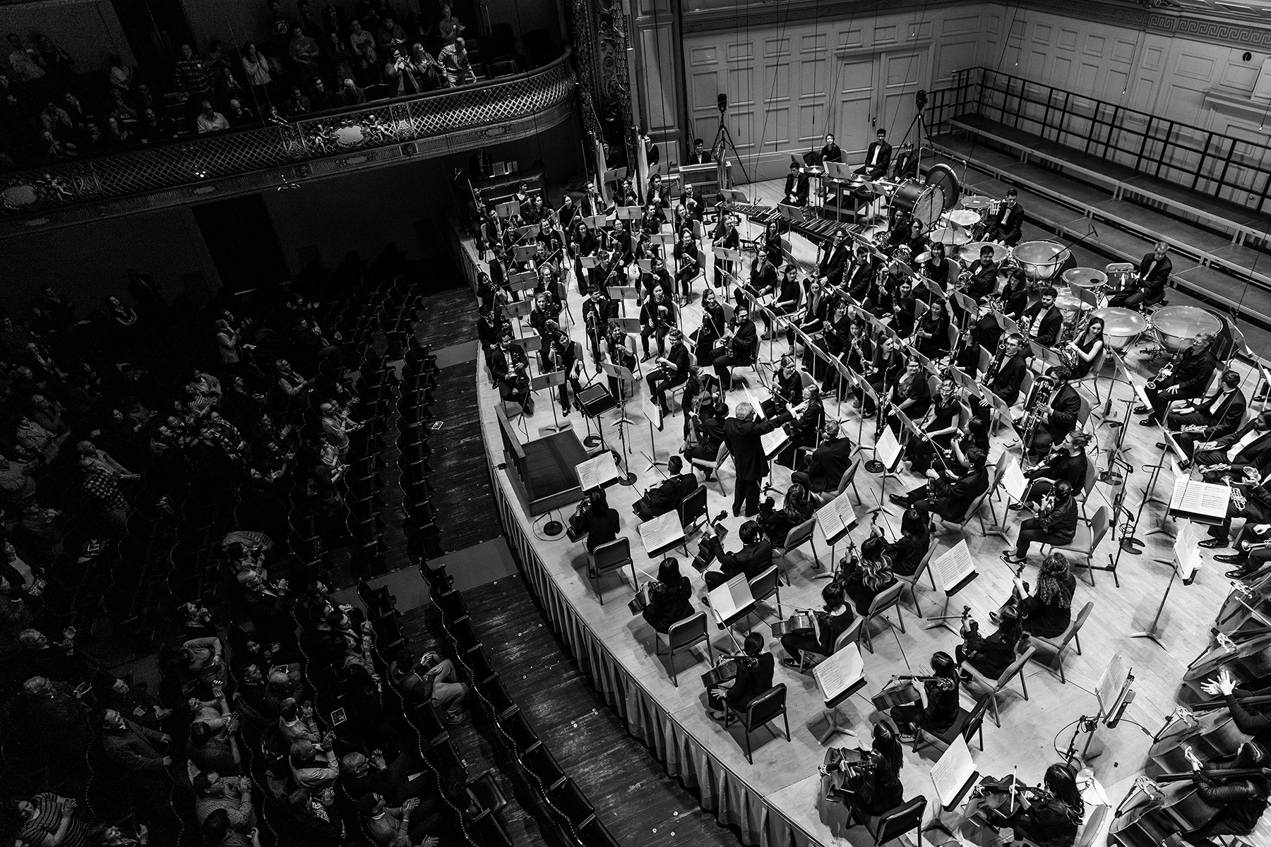 Black and white aerial shot of a Boston University ensemble performing at Symphony Hall