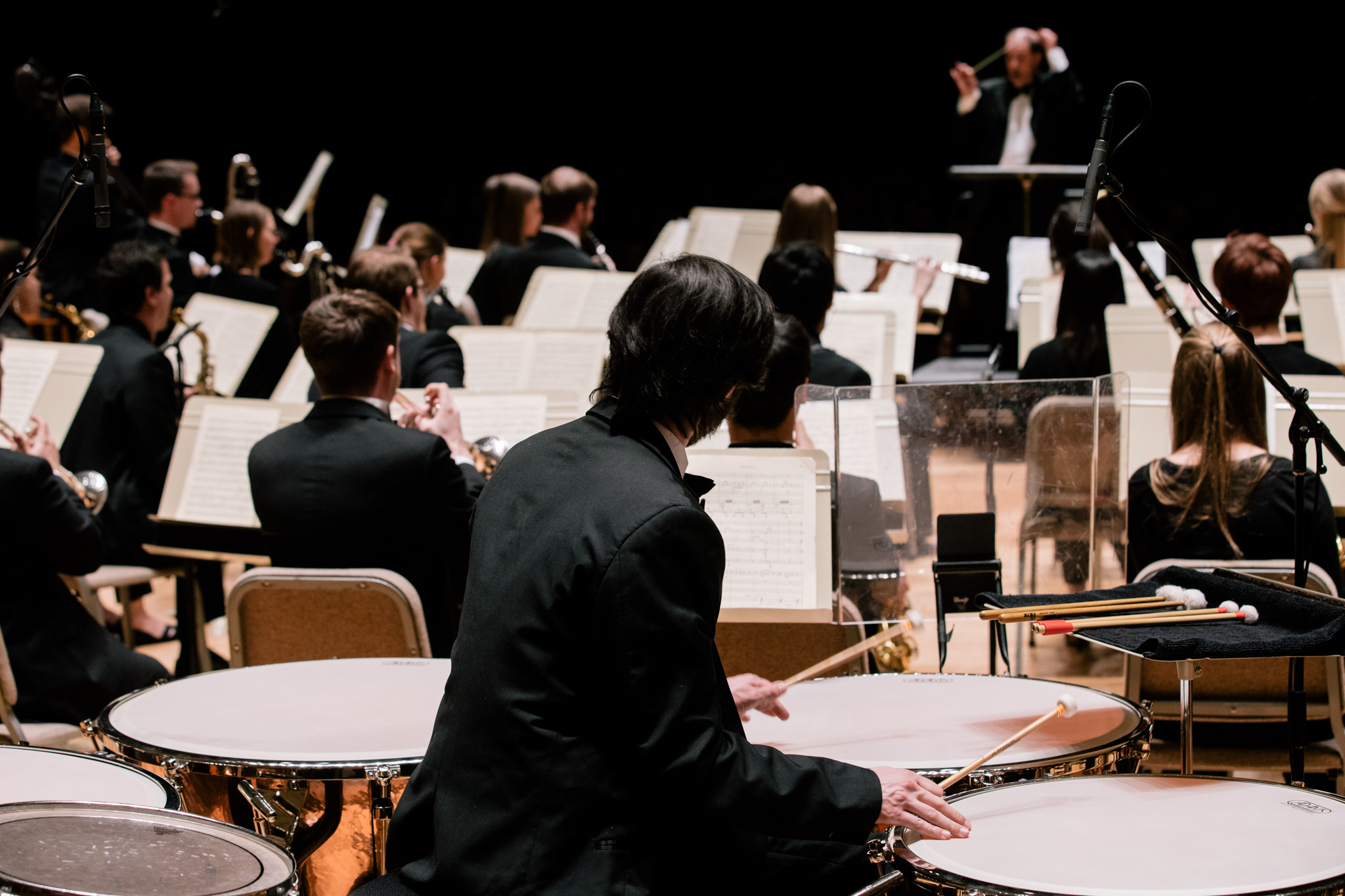 Tympani player onstage with an ensemble at Symphony Hall