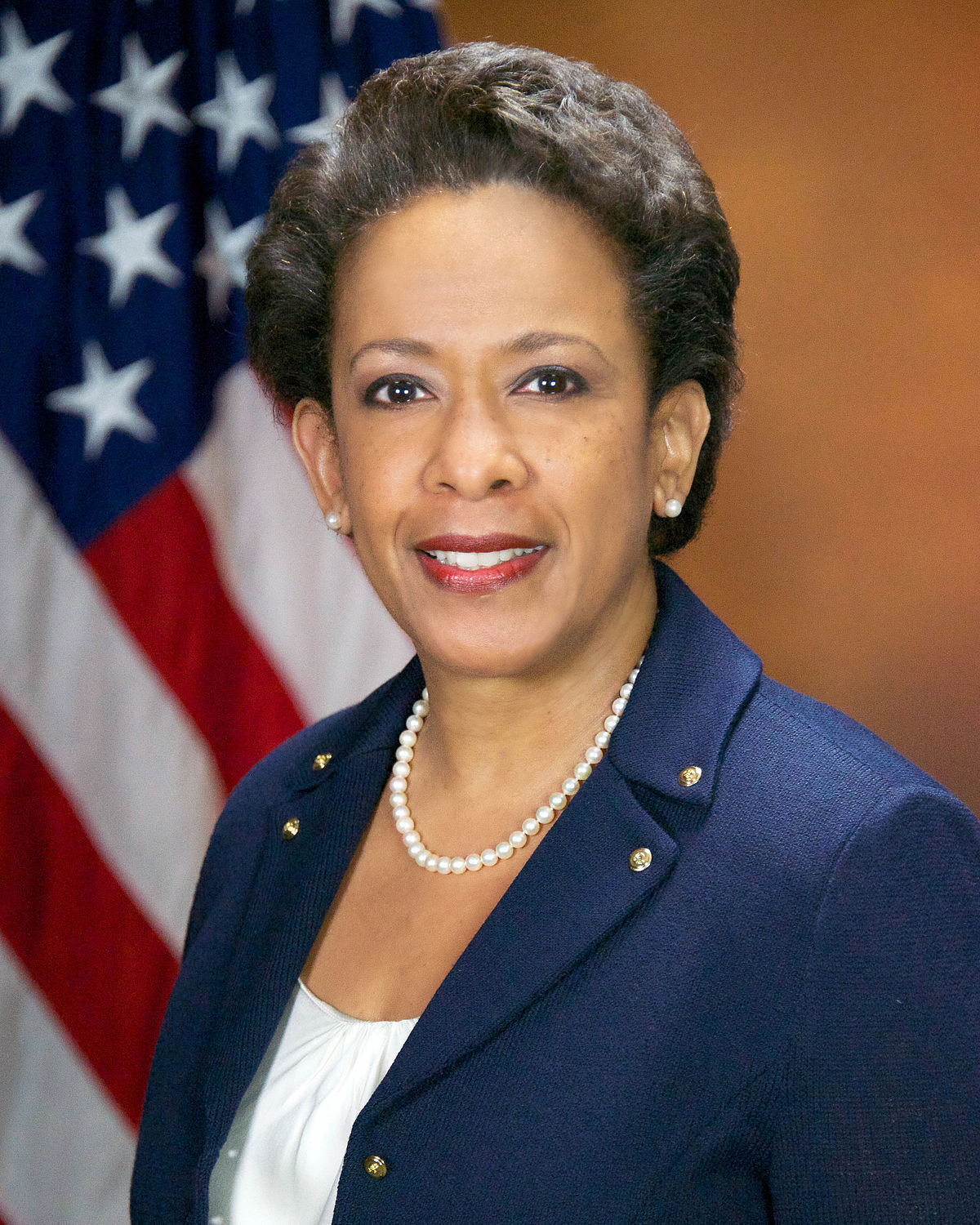 Loretta Lynch portrait in front of an American flag