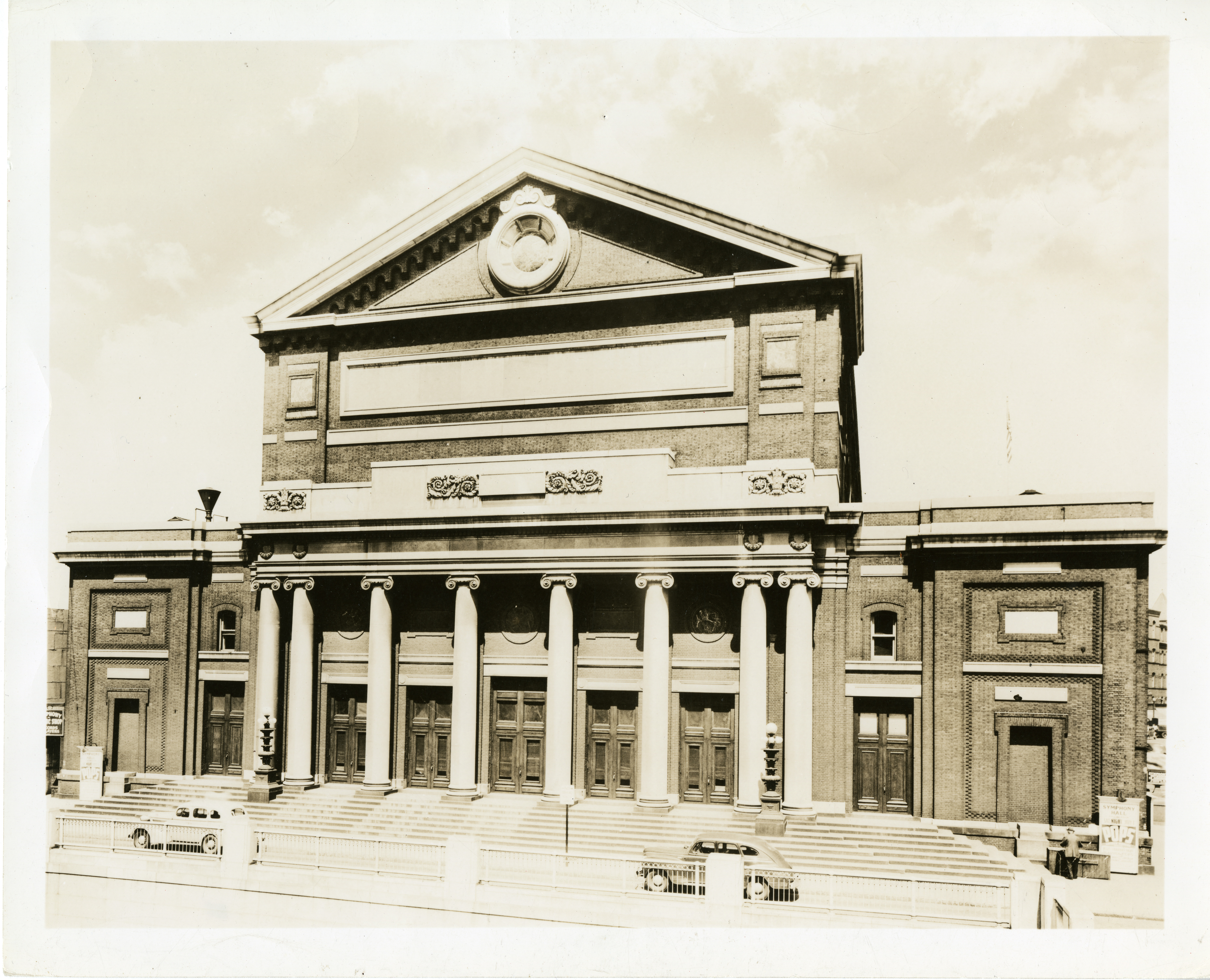 Exterior view of Symphony Hall, Huntington Avenue entrance after the Huntington Avenue underpass was completed, ca. 1947