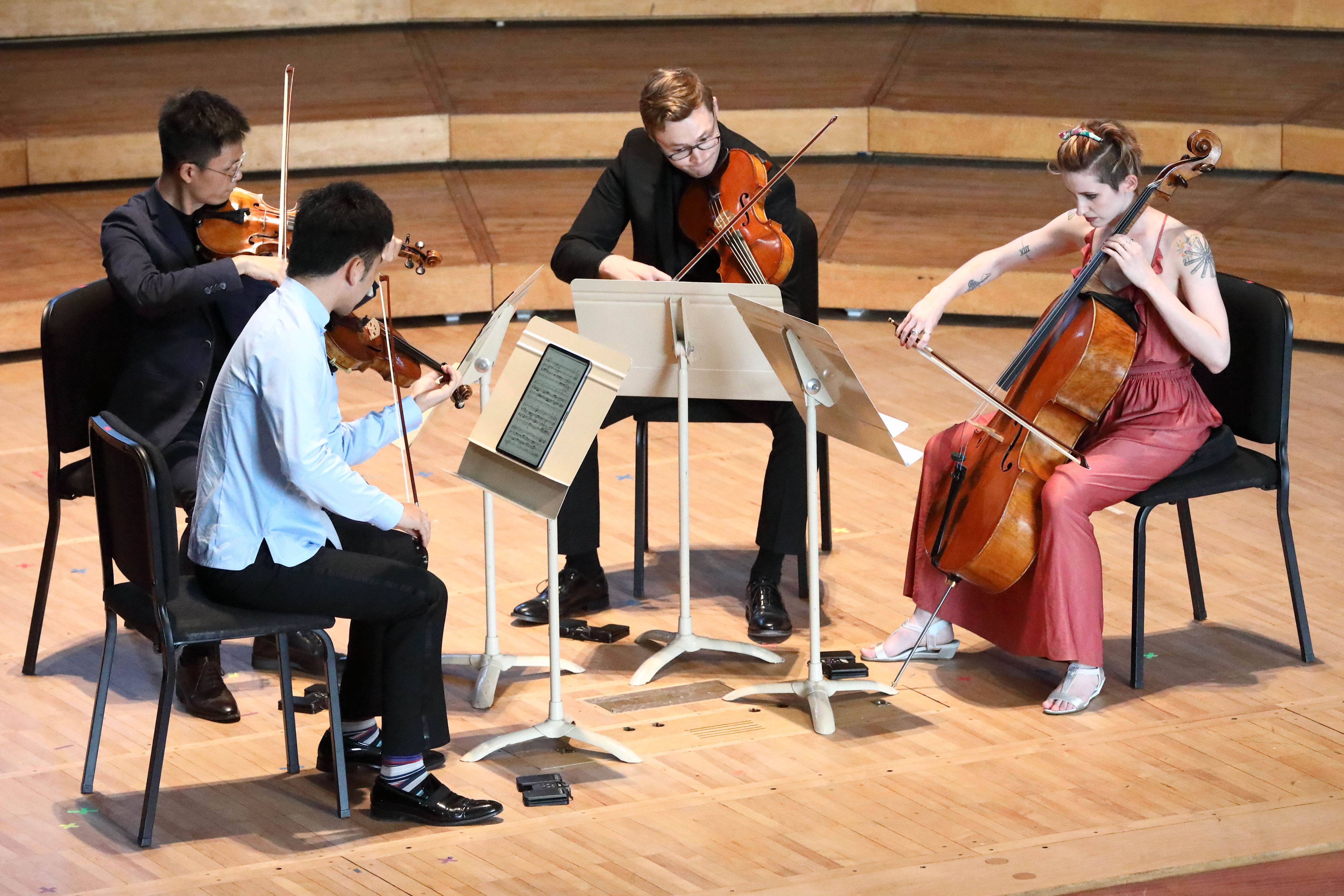 String quartet performing onstage