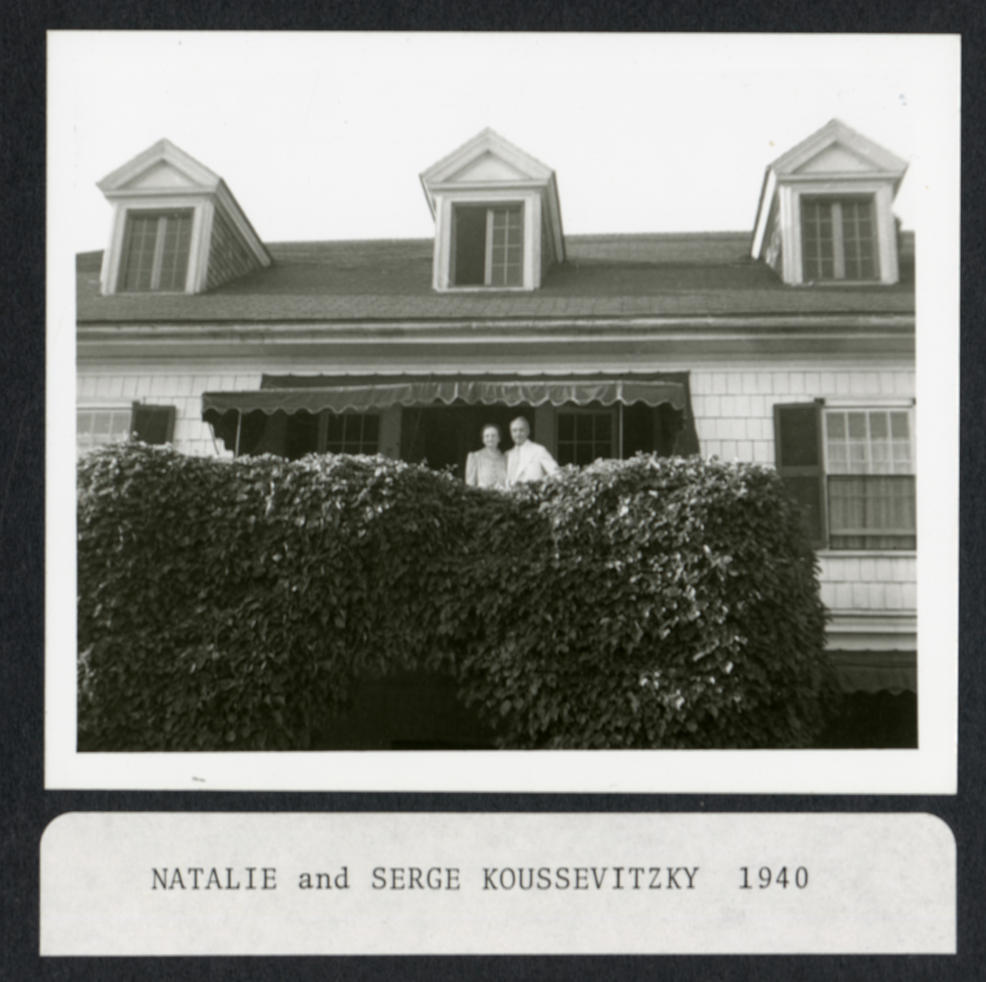 Koussevitzky and his wife Natalie stand on the balcony of Seranak, their summer home near Tanglewood