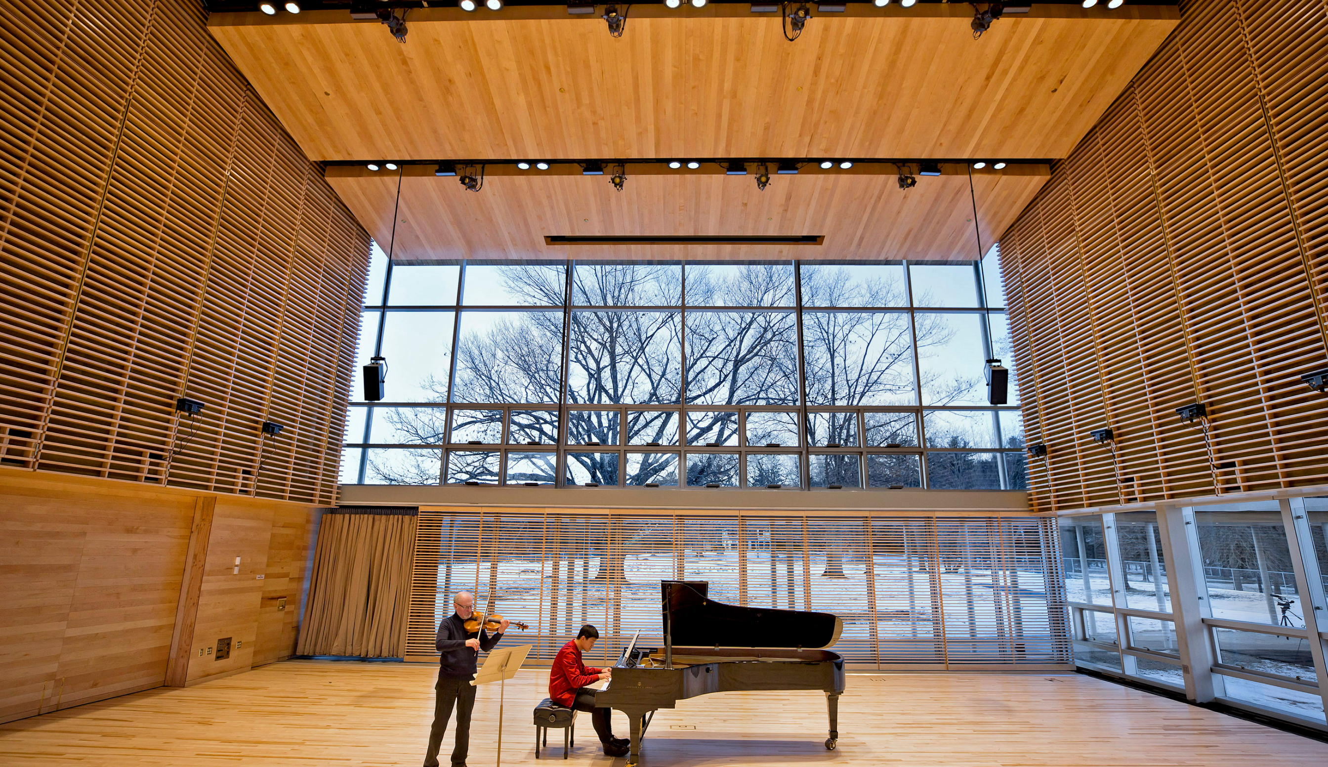 Linde Center interior with piano player and violin player