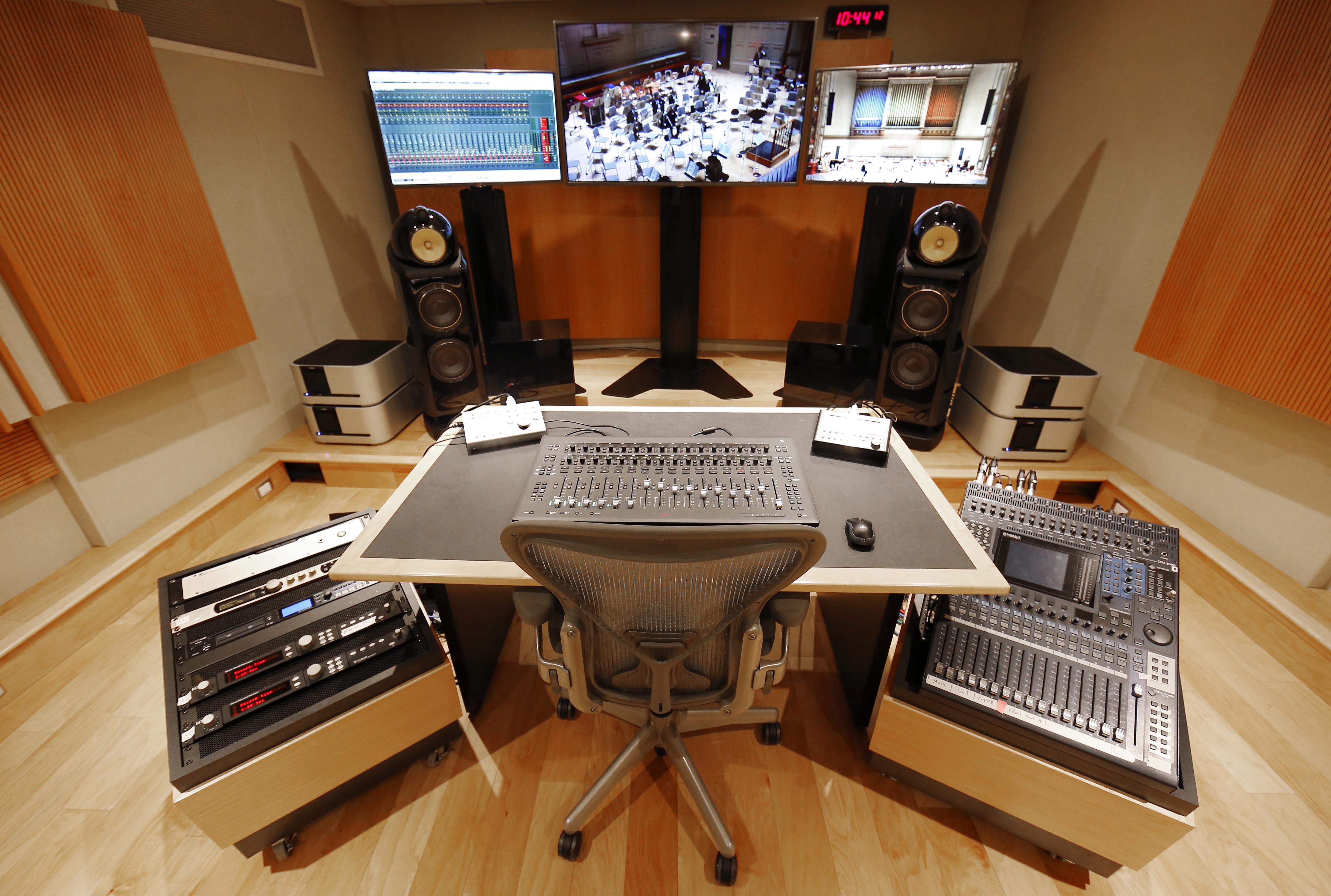 The AV control Room for Symphony Hall with multiple monitors and control panels.