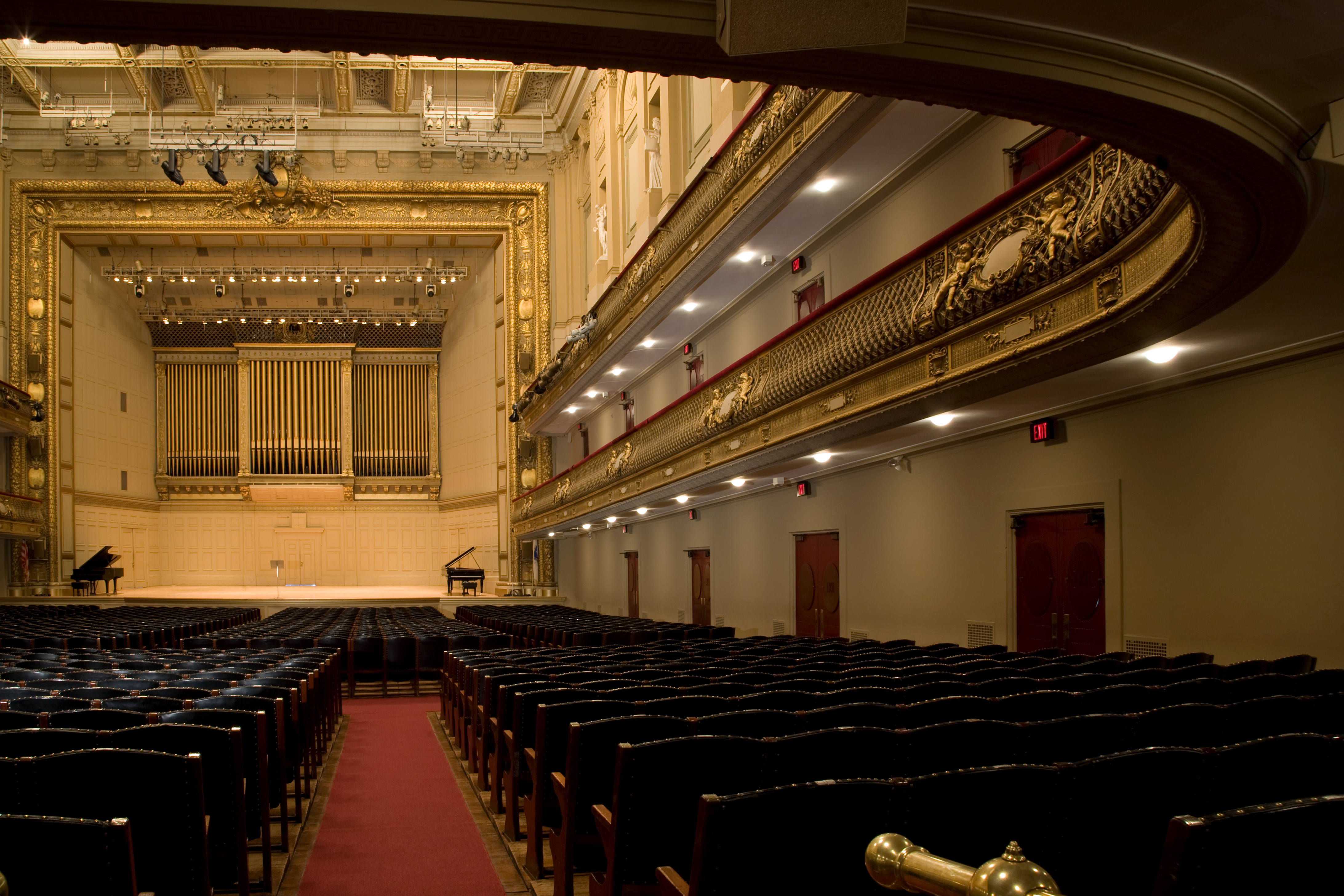 A view of the seats and stage in Symphony Hall from the audience perspective