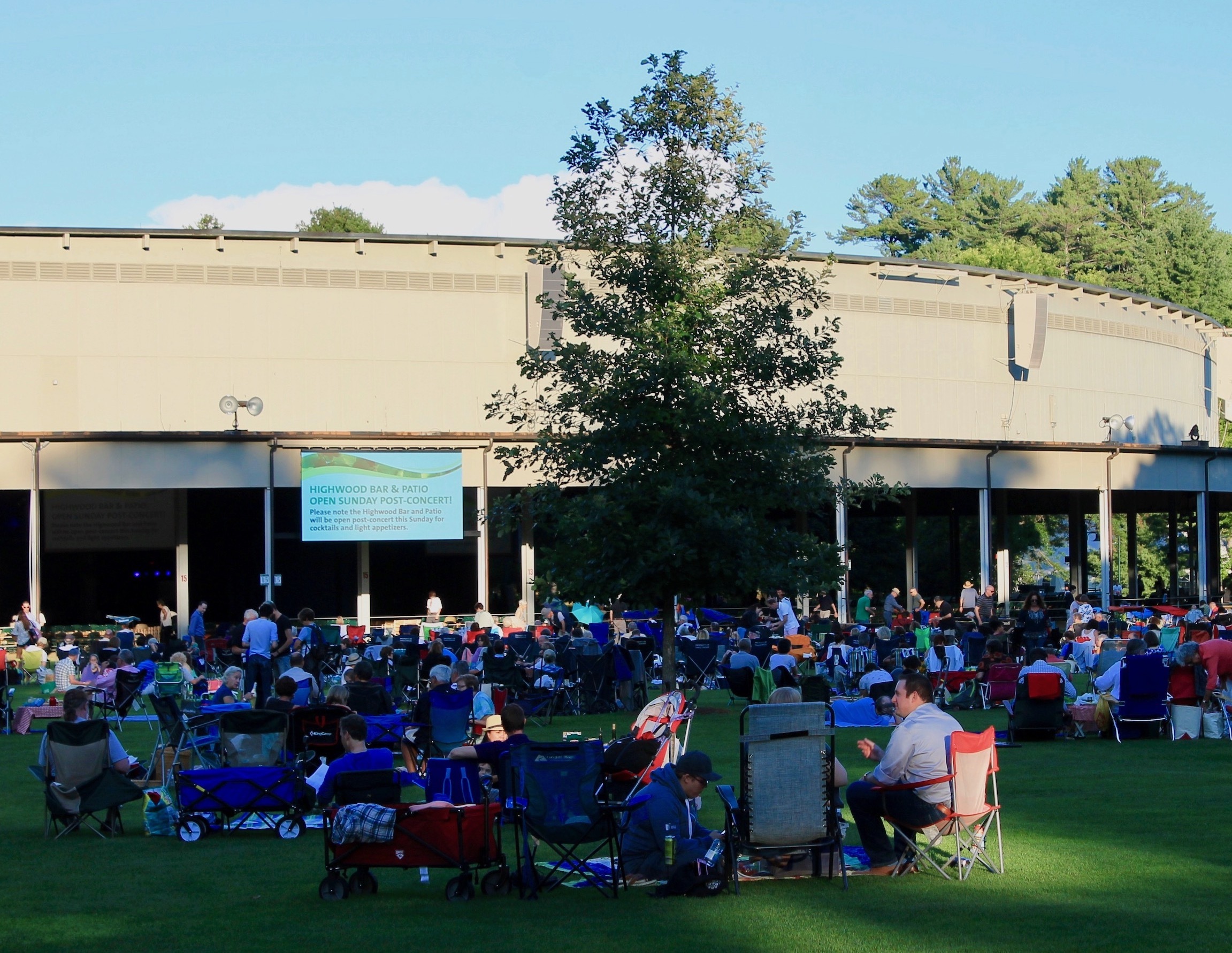 Tanglewood Lawn outside the Koussevitsky Music Shed with people