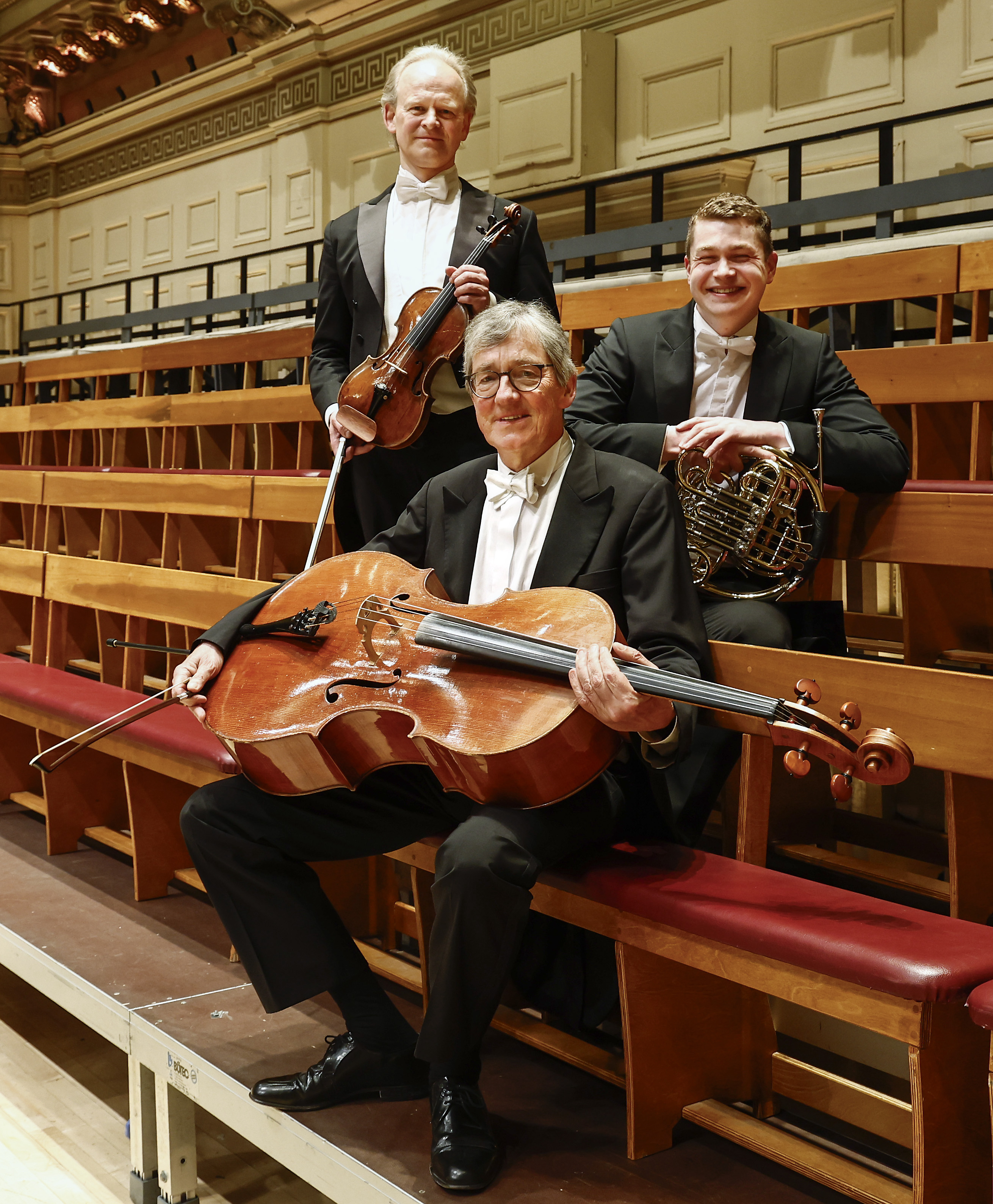 The three 2024 Leipzig exchange musicians, picture on Symphony Hall stage after their last performance with the BSO